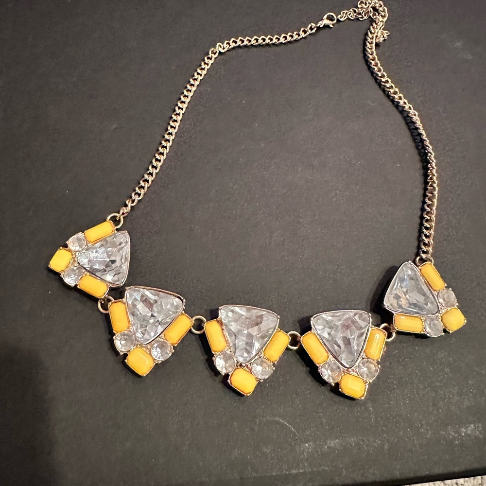 2000s jewelry.  Yellow and clear gold tone necklace.  Excellent condition.